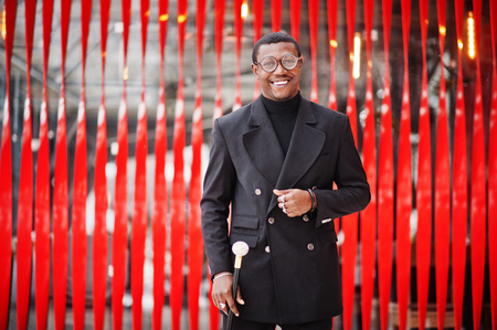 Stylish african american gentleman in elegant black jacketの写真素材