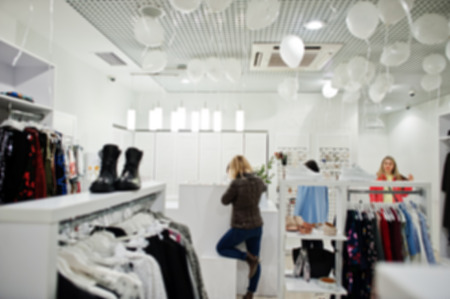 Blurred or defocused background of clothing store boutique.の写真素材