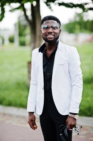 Young african american male doctor with a stethoscope posed outdoor.の写真素材