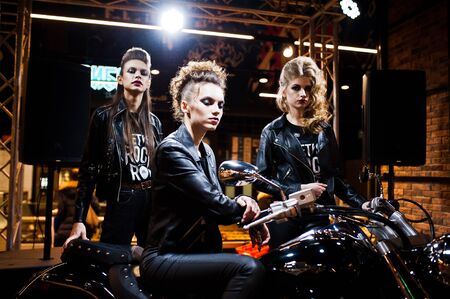 Kiev, Ukraine - September 4, 2019: Grand opening Silpo supermarket. Three girls on chopper motor bike during open store.のeditorial素材