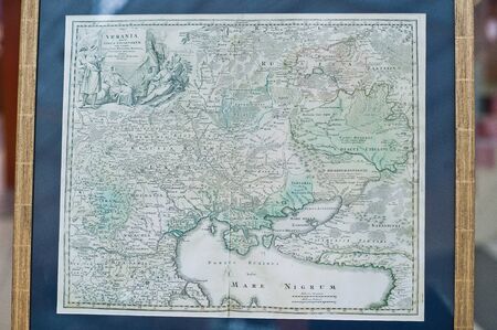 Kyiv, Ukraine - September 1, 2019: Old maps of Europe and Ukraine at 18 century.のeditorial素材