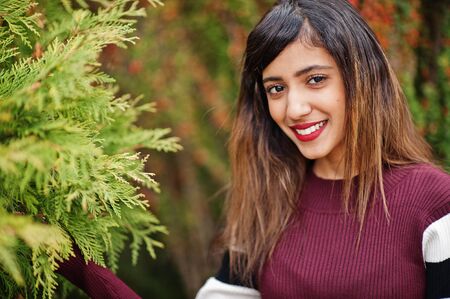Portrait of young beautiful indian or south asian teenage girl in dress.