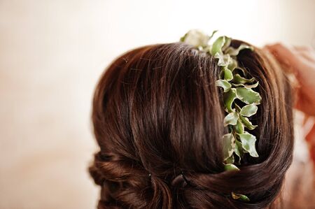 Morning of the bride preparation. Young and handsome bride at wedding day.