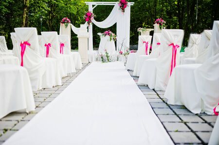 Beautiful wedding set decoration in the outdoor ceremony.の写真素材