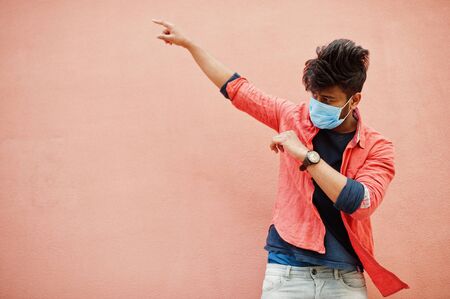 Coronavirus covid-19 concept. South asian indian man wearing mask for protect from corona virus...