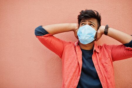 Coronavirus covid-19 concept. South asian indian man wearing mask for protect from corona virus...