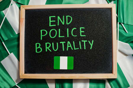 Stop injustice. Inscription of nigerian protest slogan.