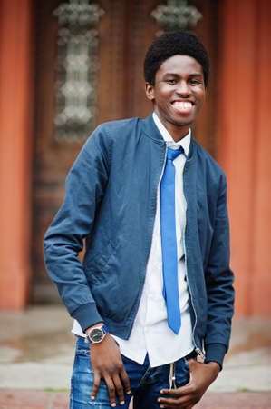 African man wear in tie and casual outfit posing outdoor.の写真素材