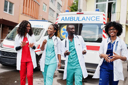 Group of african paramedic ambulance emergency crew doctors.の写真素材