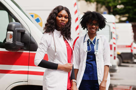 Two african paramedic ambulance emergency crew doctors.の写真素材