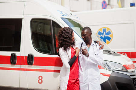 Two african paramedic ambulance emergency crew doctors.の写真素材