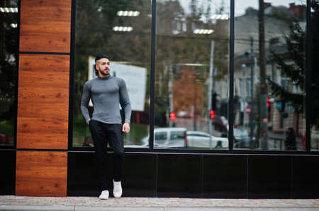 Portrait of stylish arab beard man wear gray turtleneck. Arabian model guy.の写真素材
