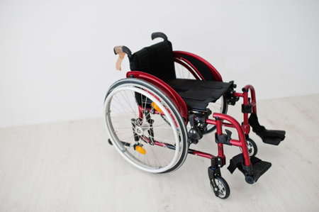 Empty wheelchair at home. Wheel chair indoor.の写真素材