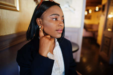 Young deaf mute african american woman using sign language.の写真素材