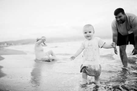 Summer vacations. Parents and people outdoor activity with children. Happy family holidays. Father,...