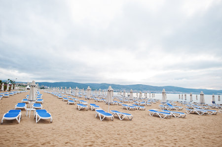 Sunny Beach on Black Sea in Bulgaria. Summer vacation travel holiday. Sunbeds.の写真素材