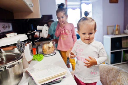 Kids cooking at kitchen, happy children's moments.の写真素材