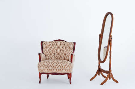 Mirror with chair isolated on white background.の写真素材