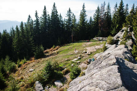 Mother with kids  in mountains. Family travel and hiking with childrens.