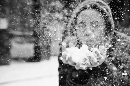 African american woman in red hoodie enjoy winter day.の写真素材
