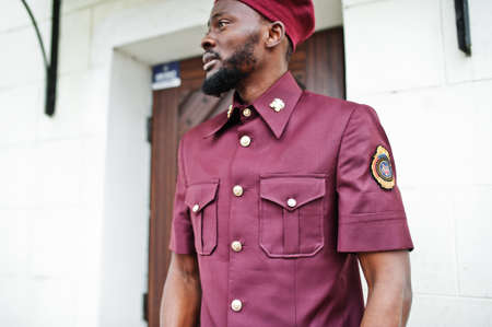 Portrait of African American military man in red uniform and beret.の写真素材