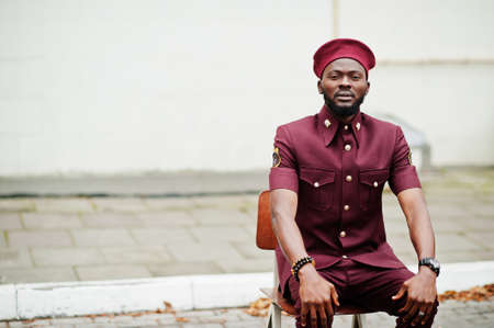Portrait of African American military man in red uniform and beret.の写真素材