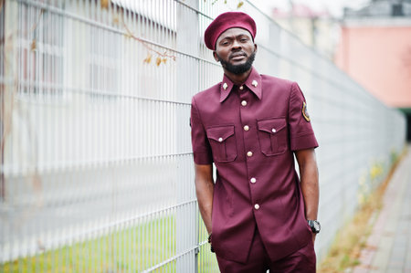 Portrait of African American military man in red uniform and beret.の写真素材