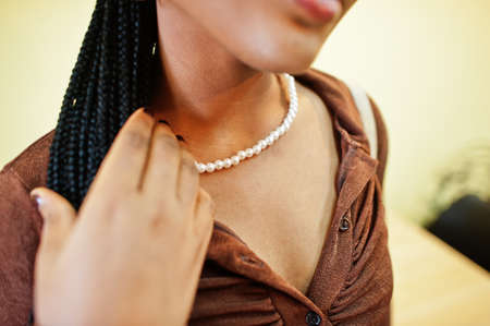 African american model wearing elegant jewelry necklace.の写真素材