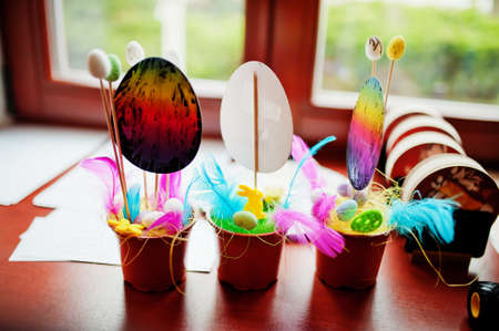 Preparing to Easter concept. Eggs in pots.