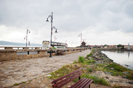 NESEBAR, BULGARIA - June 17, 2021: Bus in the road Nesebar street.のeditorial素材