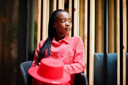 Pretty braids business african american lady bright bossy person friendly wear office red shirt, hat...