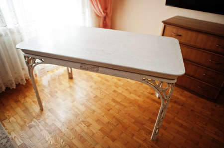 White wooden carved table in flat.の写真素材