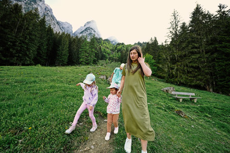 Mother with children at Vorderer Gosausee, Gosau, Upper Austria.の写真素材