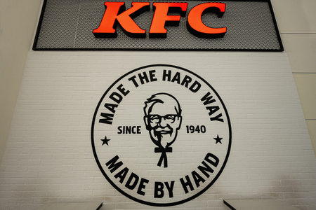 Lviv, Ukraine - October 09, 2022: KFC, Kentucky Fried Chicken logo. Made the hard way, made by hand.