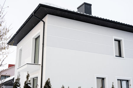 Modern designed white house with big garage, exterior view.の写真素材