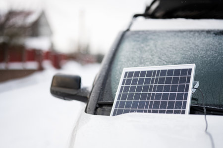 Portable solar panel on SUV car at winter close up view.の写真素材