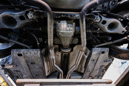 Service repair station working with muscle car.  Bottom view of pickup carの写真素材