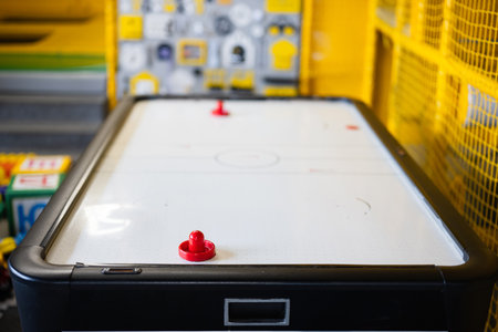 Air hockey at kids play center.の写真素材