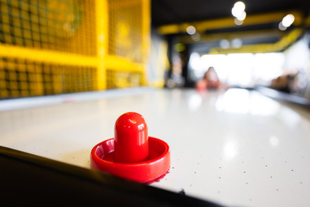 Air hockey at kids play center.の写真素材