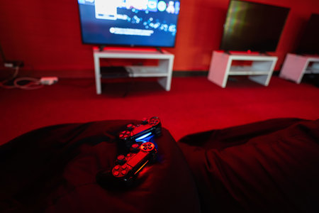 Two joysticks in red play zone room.の写真素材
