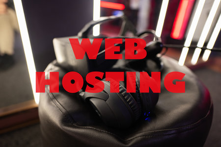 Web hosting concept. Professional headphones with microphone and vr glasses for video games and cyber sports on background.の写真素材