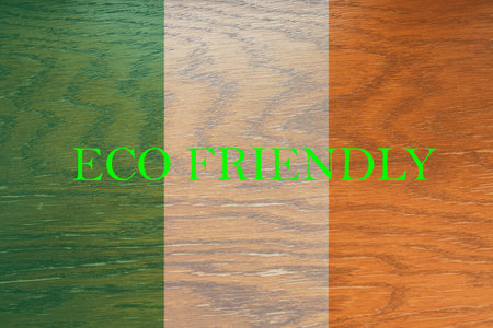 Ireland flag on wooden background for global eco friendly environment, ecological and environmental saving and go green country concept.の写真素材