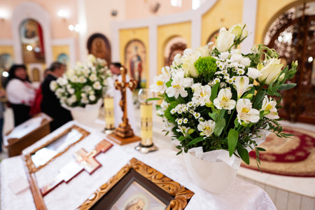 Bouquet of white flowers in the Orthodox churchの写真素材