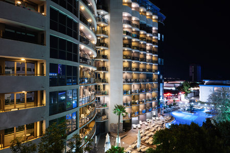 Sunny Beach, Bulgaria- June 2023: Night view of the Smartline Meridian Hotel from the balcony of Dunav hotel in Sunny Beach, Bulgaria.のeditorial素材