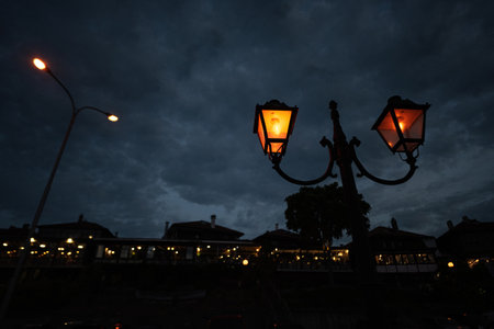 Lanterns on the street in the city at night Nessebar, Bulgaria.の写真素材
