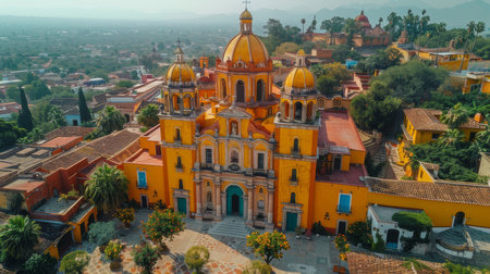 A breathtaking aerial view of San Miguel de Allende, Mexico, showcasing the vibrant yellow architecture of Miramar Overlook with mountains in the background.の素材