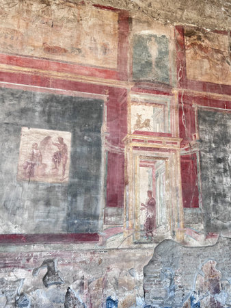 An ancient Roman fresco showcasing classical art and architectural design, featuring intricate details and vibrant colors. Testament to the skill of Roman artists. Pompeii, Italy.の写真素材