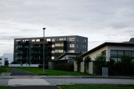 Residential view in Akranes, Iceland featuring modern apartments and traditional houses.