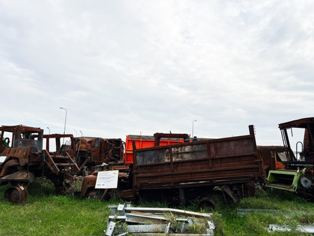 Shehyni, Ukraine - October 22, 2025: Polish Ukrainian border.  Exhibition of burnt farm machineries as a result of the russian war aggression.のeditorial素材