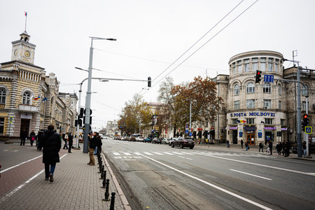 Chisinau, Moldova - November 22, 2025: A busy urban street in Chisinau featuring historic...